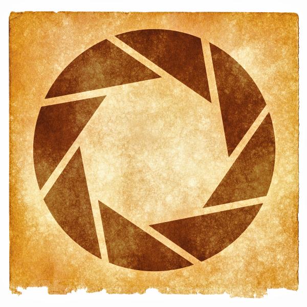 Lens Aperture Grunge Symbol - Sepia