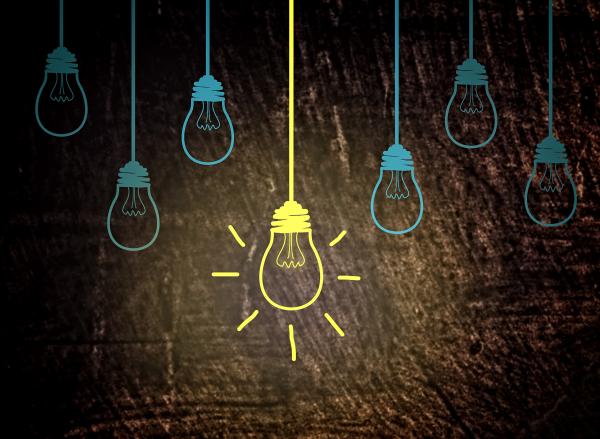 Lightbulbs on wood - Creativity concept