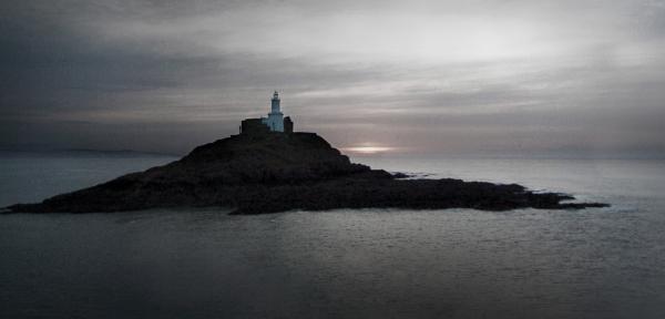Lighthouse and sea