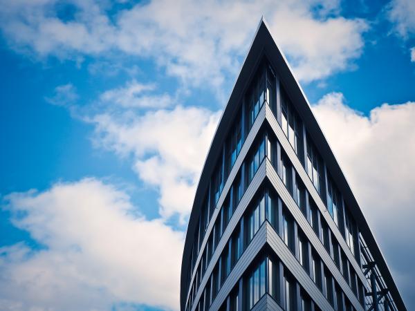 Low Angle View of Building Against Cloudy Sky