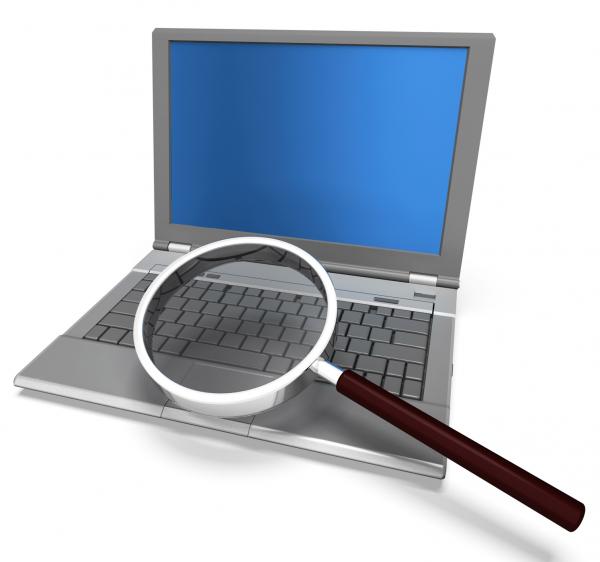 Magnifying Glass And Laptop Shows Search Searching And Research