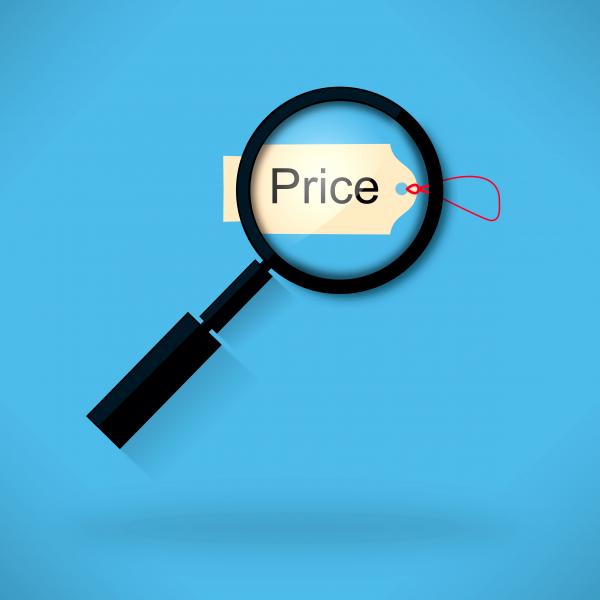 Magnifying glass over price tag label