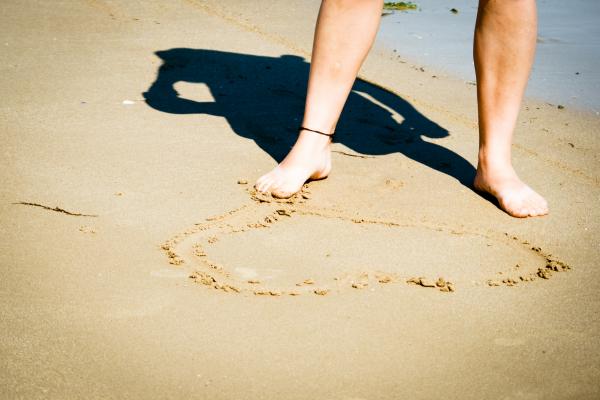 Making a heart in the sand
