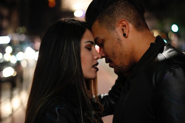 Man and Woman About to Kiss Each Other