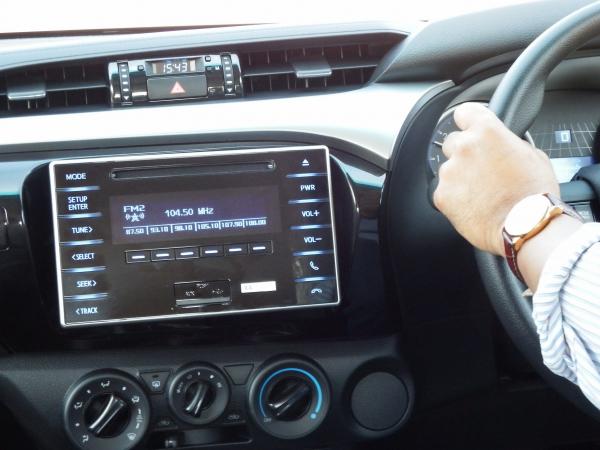 Man Driving a Modern Car