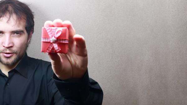 Man holding a gift box