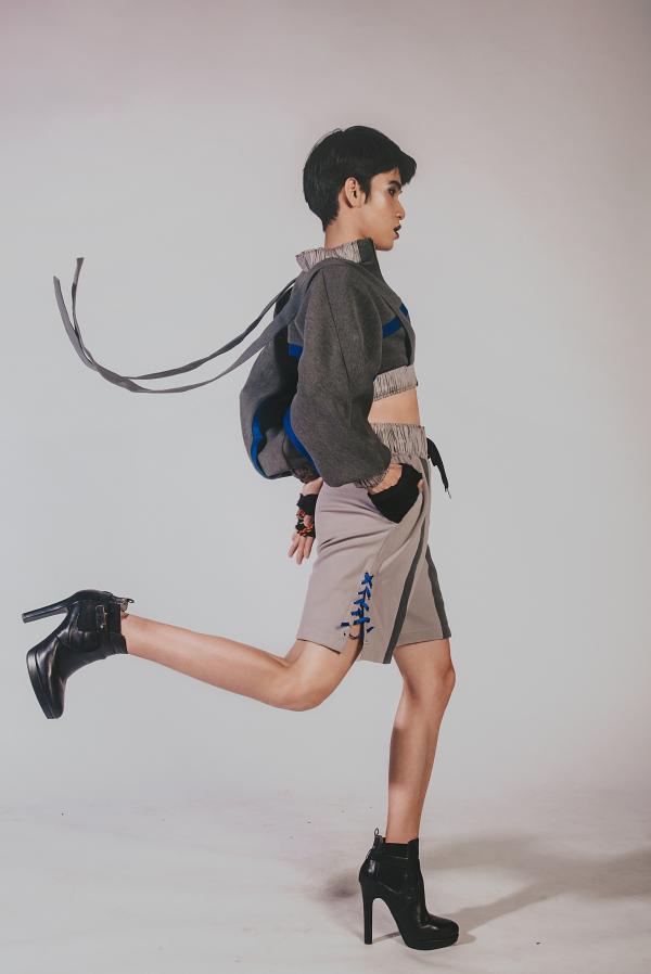 Man in Black and Grey Jacket and Shorts