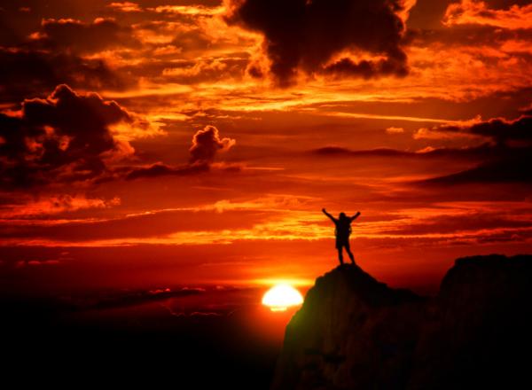 Man on top of the mountain