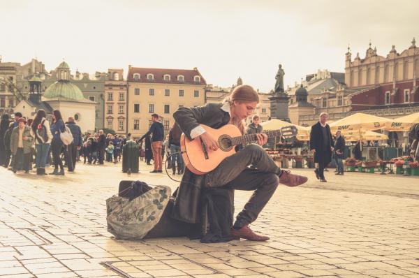 Man Playing Acoustic Guitar