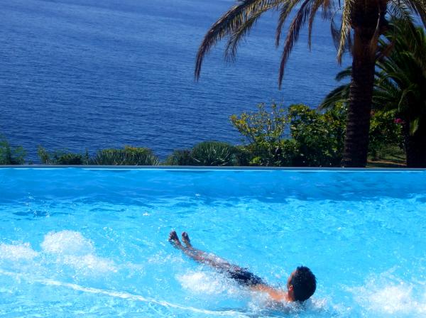 Man relaxing in the swimming pool
