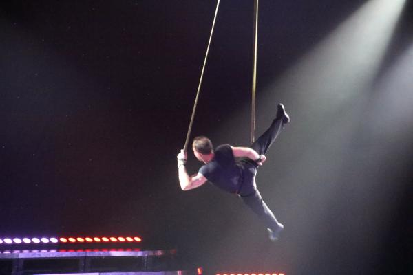 Man shows a circus trick