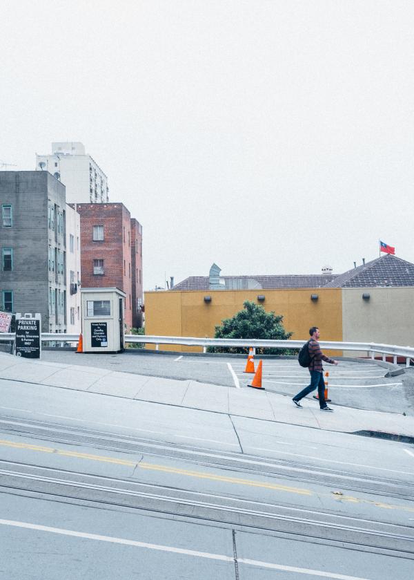 Man Walking on the Street