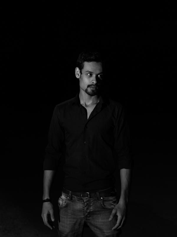 Man Wearing Black Dress Shirt