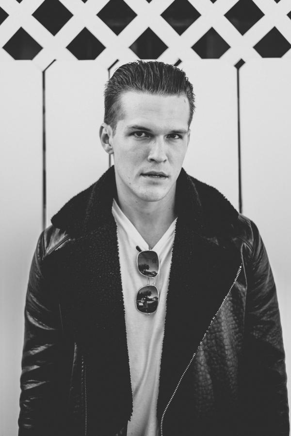 Man Wearing Black Leather Zip-up Jacket