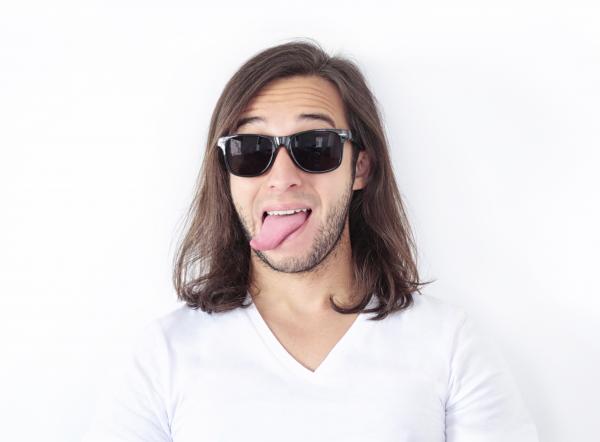 Man Wearing Sunglasses and White V Neck Shirt
