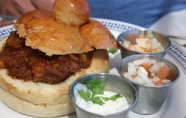 Meal with burger and different sauces