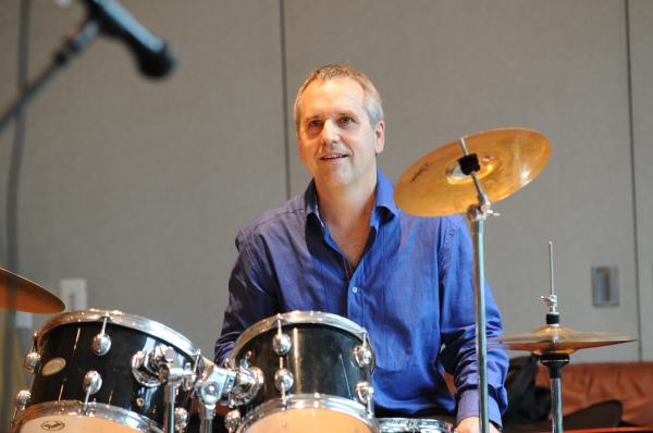 Michael Jordan (drummer) smiling, looking forward left