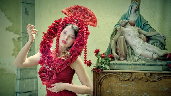 Midsection of Woman Wearing Red Flower