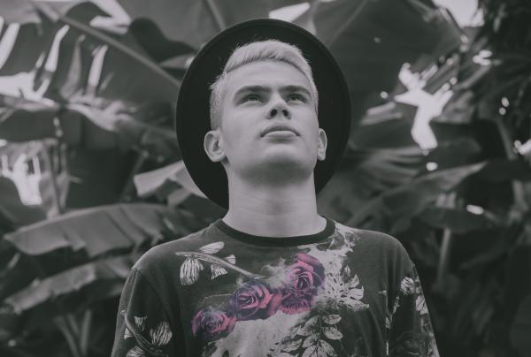 Monochrome Photography of Man Wearing Hat