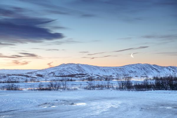 Moonrise in Þingvellir during twilight