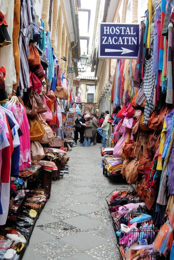 Narrow market street with shops