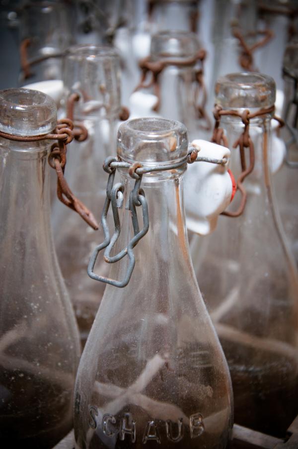 Old bottles in wooden box