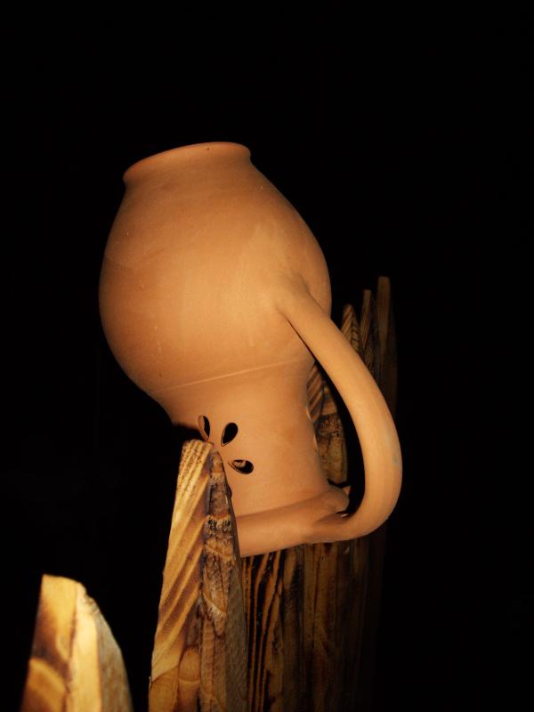 Old pitcher on the fence