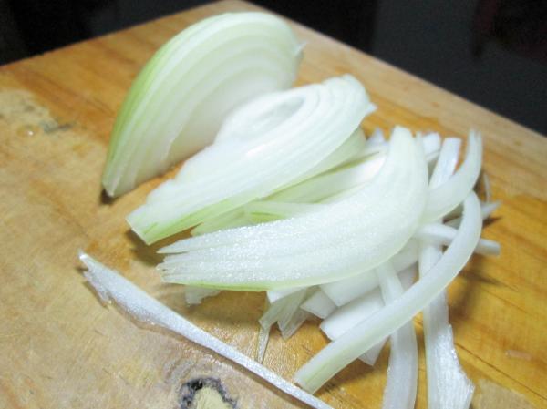 Onions on chopping board