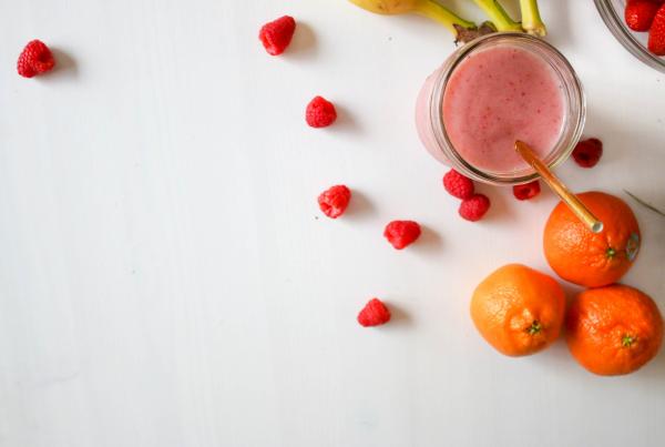 Orange Fruit And Raspberries