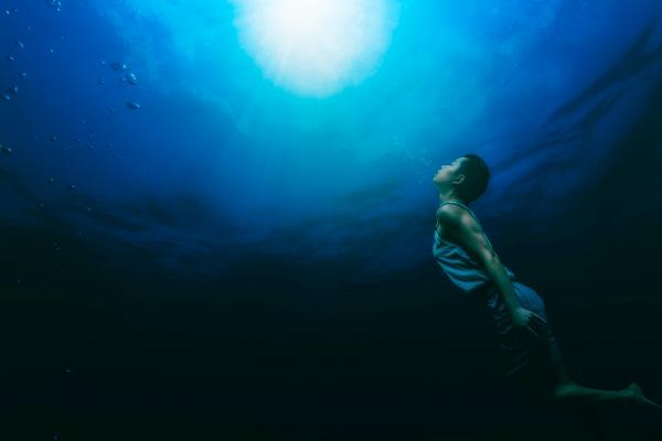 Painting of a Person Swimming Underwater