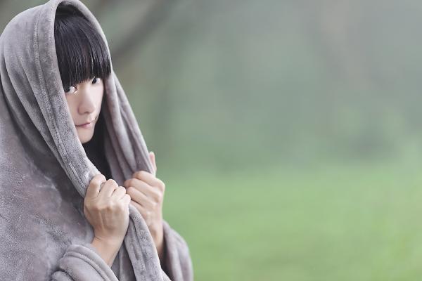 Person Wearing Gray Hoodie in Macro Lens Photography