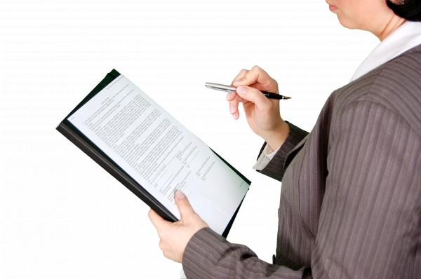 Person Wearing Grey Dress Shirt Holding Black Push Pen