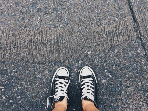 Person Wearing Pair of Black-and-white Converse All Star Low Sneakers