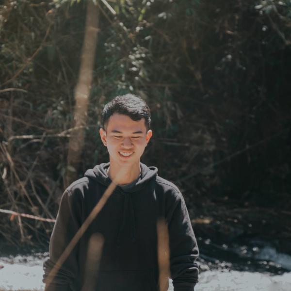 Photo of Man Wearing Black Hoodie