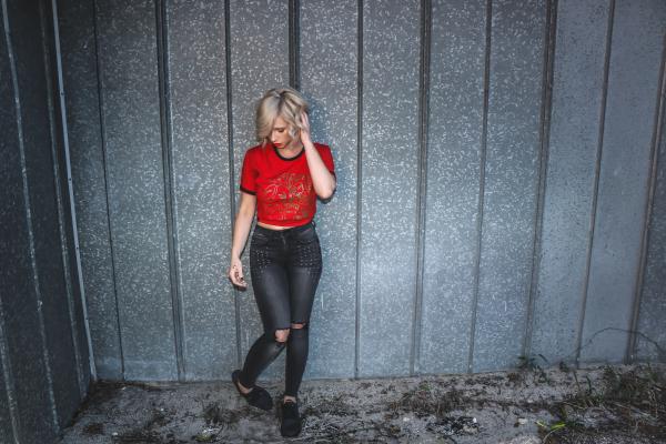 Photo of Woman in Red Crew Neck T-shirt