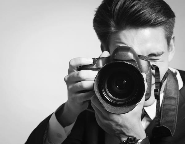 Photographer using camera