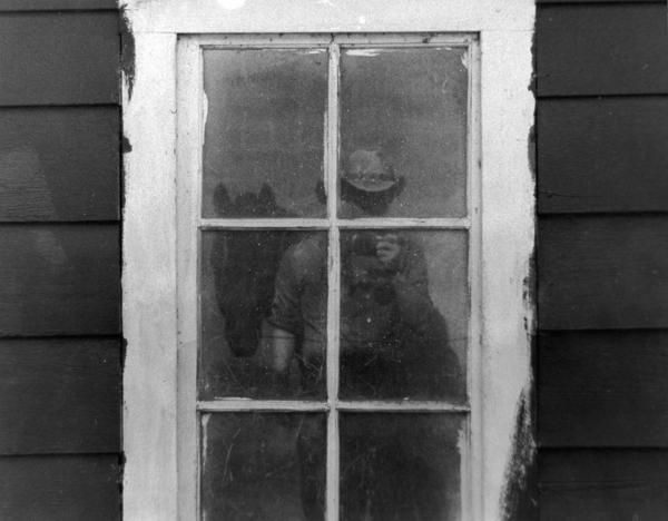 Photographer in the window