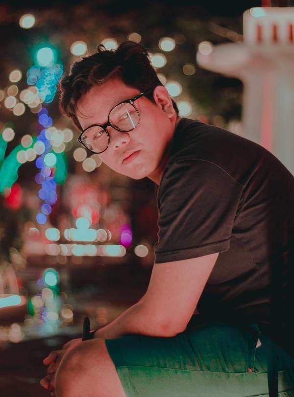 Photography of a Man Wearing Eyeglasses