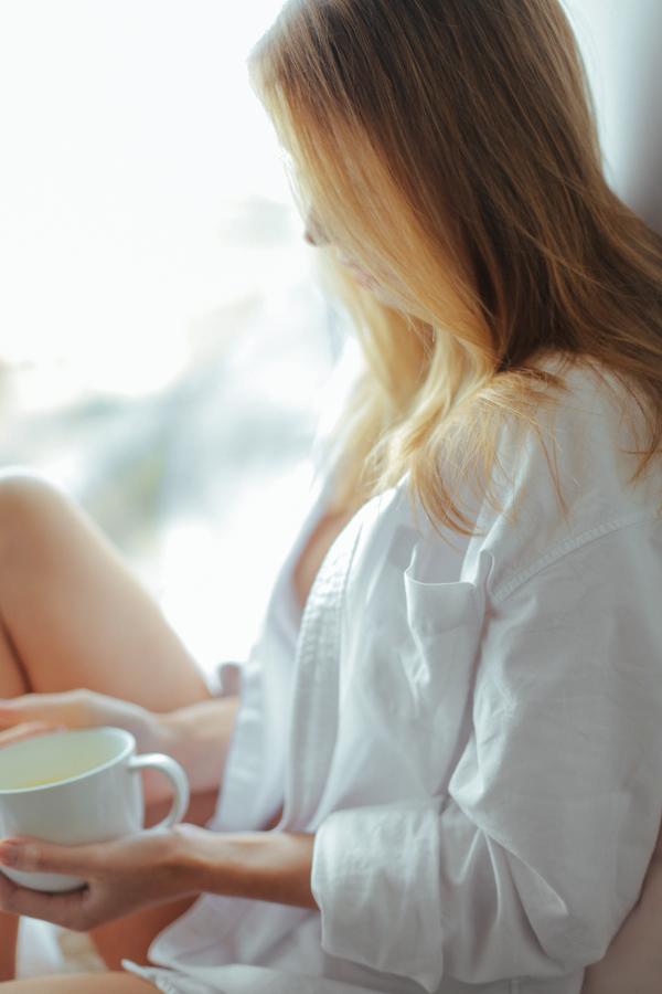 Photography of a Woman in White Dress Shirt