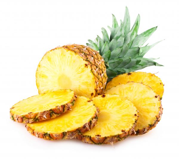 Pineapple with slices isolated on white