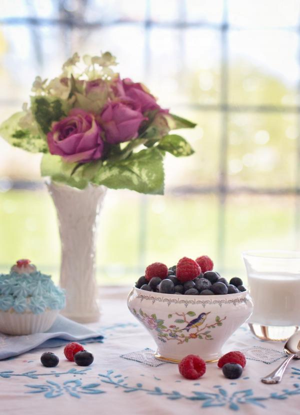 Pink Flowers Near Fruit Bowl