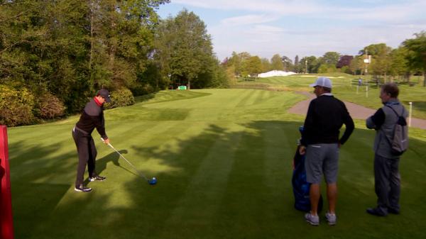 Player practicing golf