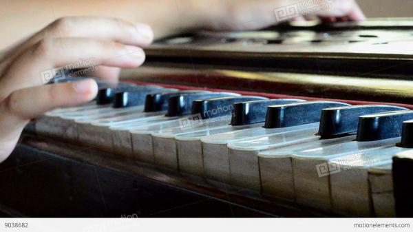 Playing Harmonium