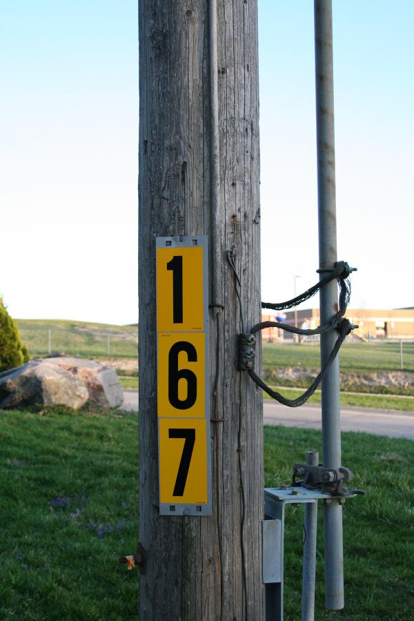 Pole with yellow sign