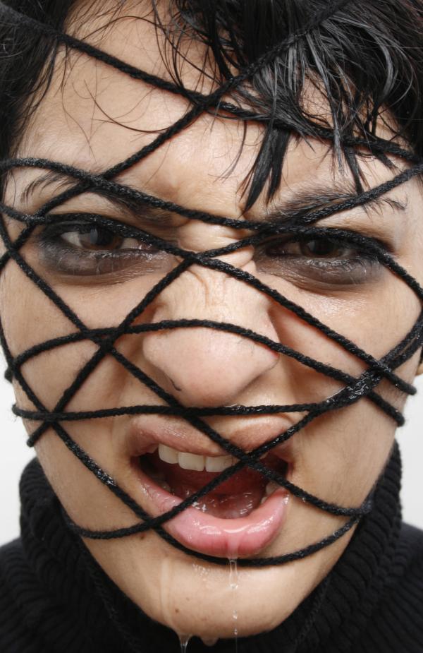 Portrait of a woman's face in rope