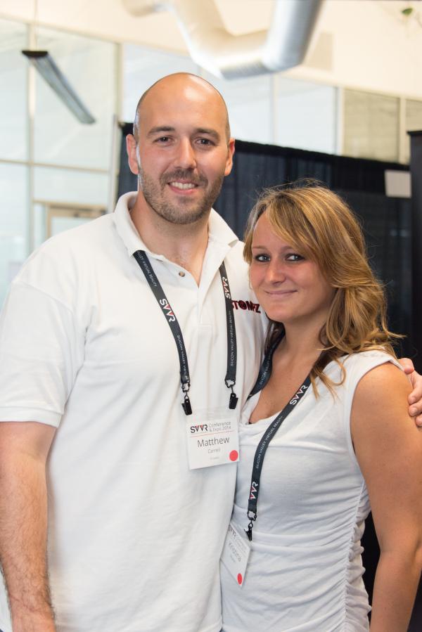 Posed portrait of Matthew Carrell of Stompz and girlfriend Kristina Mullen at SVVR expo (full upper bodies)
