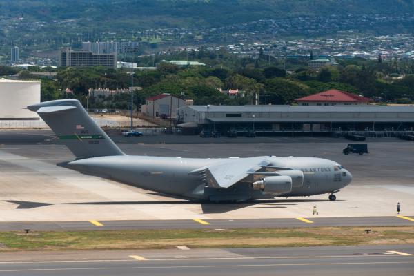 Profile view of U.S. Air Force jet on tarmac at Joint Base Pearl Harbor-Hickam