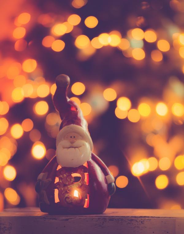 Red and White Ceramic Santa Claus Figurine