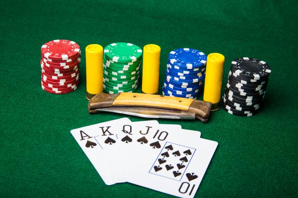 Royal Flush with bullets and knife