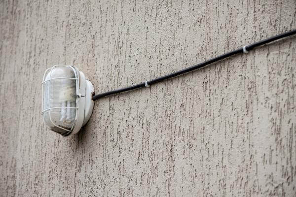 Rusty exterior light and cable